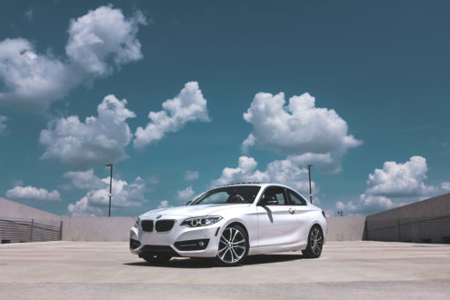 parked white BMW coupe